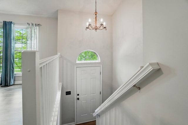 418 Broadview Ct, Pataskala, OH 43062 - foyer featuring a chandelier and dark wood-type flooring