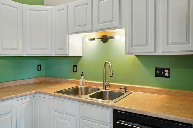 418 Broadview Ct, Pataskala, OH 43062 - kitchen featuring a sink, black dishwasher, white cabinetry, and light countertops