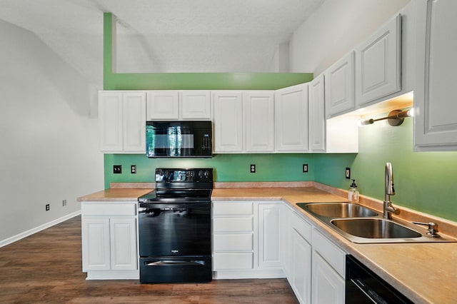 418 Broadview Ct, Pataskala, OH 43062 - kitchen featuring black appliances, a sink, white cabinetry, and vaulted ceiling