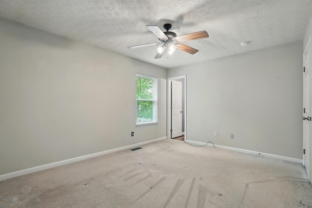 418 Broadview Ct, Pataskala, OH 43062 - empty room with baseboards, a ceiling fan, light colored carpet, and a textured ceiling