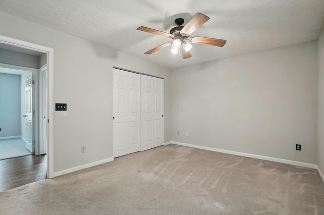 418 Broadview Ct, Pataskala, OH 43062 - unfurnished bedroom featuring carpet, baseboards, a closet, and ceiling fan