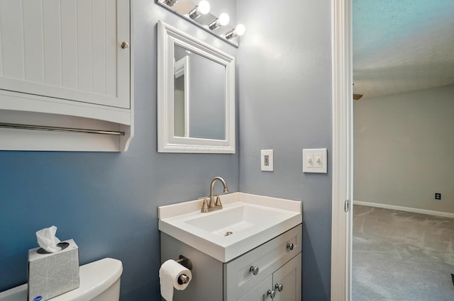 418 Broadview Ct, Pataskala, OH 43062 - bathroom with vanity, toilet, and baseboards