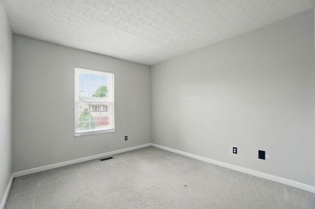418 Broadview Ct, Pataskala, OH 43062 - carpeted spare room with baseboards and a textured ceiling