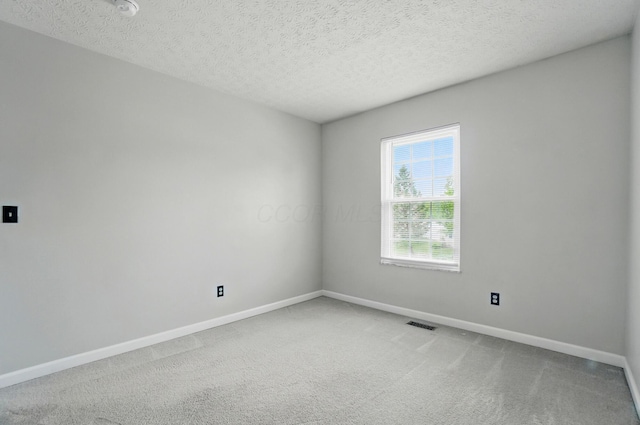 418 Broadview Ct, Pataskala, OH 43062 - empty room with carpet floors, baseboards, a textured ceiling, and a smoke detector