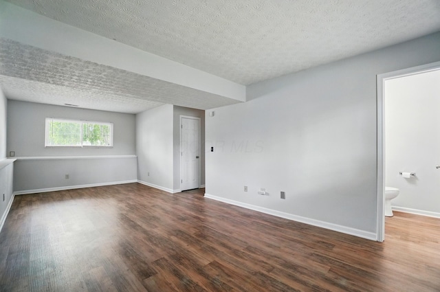 418 Broadview Ct, Pataskala, OH 43062 - spare room featuring wood finished floors, baseboards, and a textured ceiling