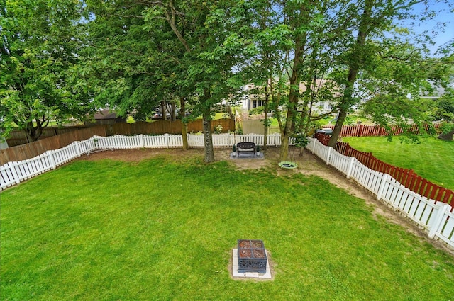 418 Broadview Ct, Pataskala, OH 43062 - view of yard featuring an outdoor fire pit