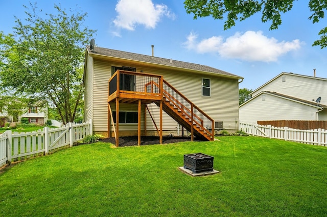 418 Broadview Ct, Pataskala, OH 43062 - back of property with an outdoor fire pit, stairs, and a wooden deck