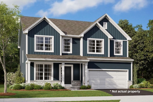 12281 Tybee Way, Pickerington, OH 43147 - view of front of home with board and batten siding, covered porch, asphalt driveway, an attached garage, and stone siding