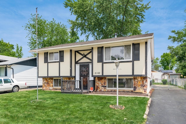 2142 Balford Sq W, Columbus, OH 43232 - raised ranch with stone siding and a gate
