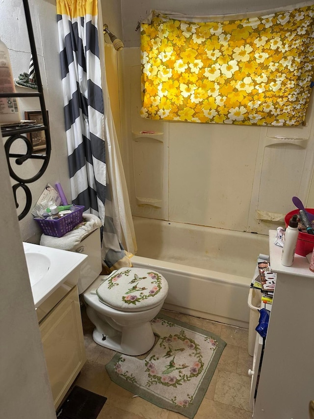 803 Demorest Rd, Columbus, OH 43204 - bathroom featuring vanity, toilet, and shower / tub combo with curtain