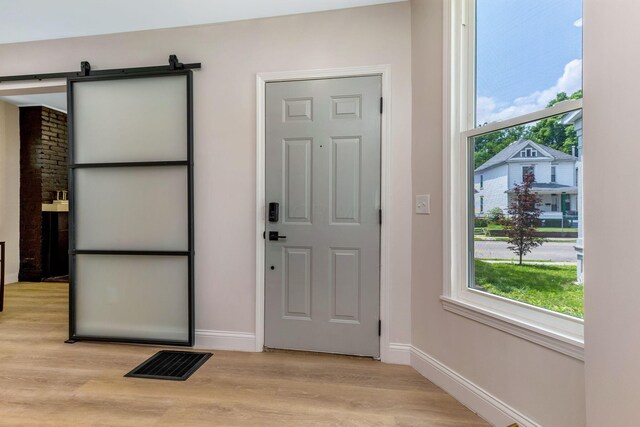 72 Avondale Ave, Columbus, OH 43222 - foyer entrance with light wood-type flooring and baseboards