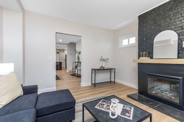 72 Avondale Ave, Columbus, OH 43222 - living room with wood finished floors and a fireplace