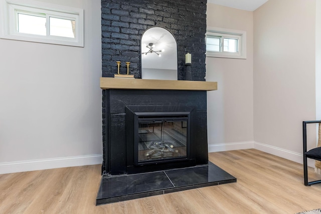 72 Avondale Ave, Columbus, OH 43222 - detailed view of wood finished floors and a large fireplace