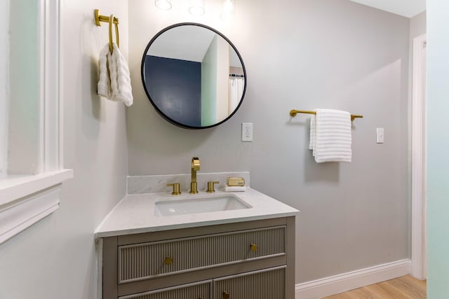 72 Avondale Ave, Columbus, OH 43222 - full bath featuring vanity and wood finished floors