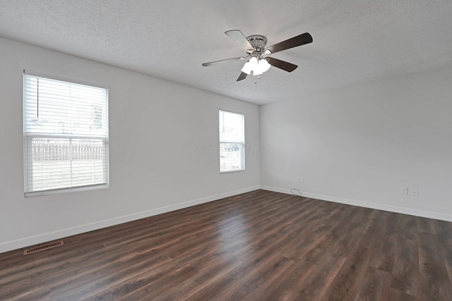 2576 Brook Run Dr, Lancaster, OH 43130 - empty room with dark wood-style flooring, a textured ceiling, baseboards, and a ceiling fan
