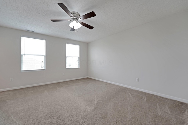 2576 Brook Run Dr, Lancaster, OH 43130 - unfurnished room with a textured ceiling, baseboards, light colored carpet, and ceiling fan