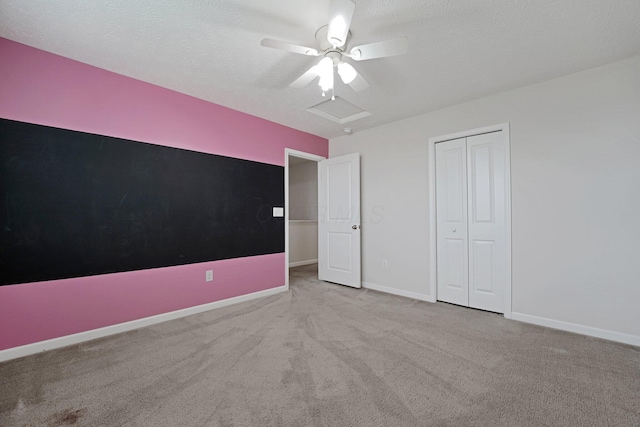 2576 Brook Run Dr, Lancaster, OH 43130 - unfurnished bedroom with carpet flooring, baseboards, a closet, attic access, and ceiling fan
