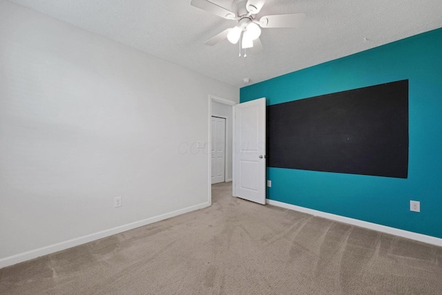 2576 Brook Run Dr, Lancaster, OH 43130 - carpeted empty room featuring baseboards, ceiling fan, and a textured ceiling