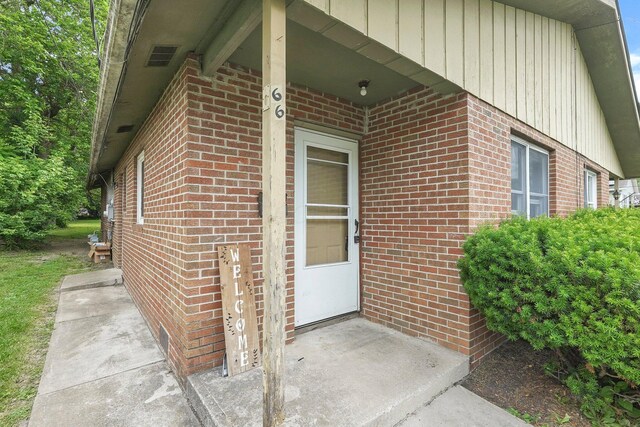 66-64 Eaton St, Delaware, OH 43015 - view of exterior entry with brick siding