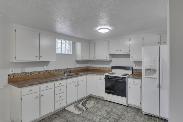 4476 Stiving Rd, Shelby, OH 44875 - kitchen featuring white refrigerator with ice dispenser, electric range, a textured ceiling, white cabinets, and dark countertops