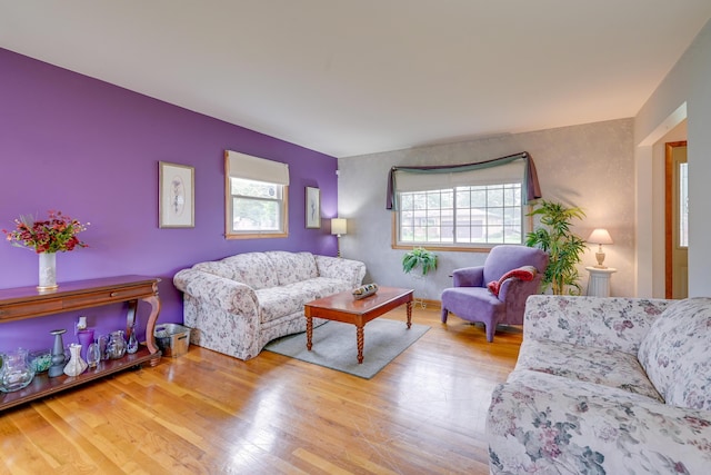 4909 Vanlear Rd, Columbus, OH 43229 - living room with an accent wall and wood finished floors
