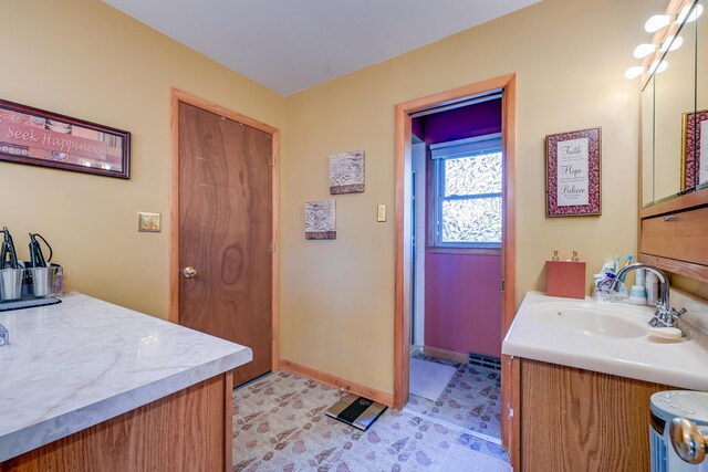 4909 Vanlear Rd, Columbus, OH 43229 - bathroom featuring vanity and baseboards