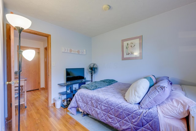 4909 Vanlear Rd, Columbus, OH 43229 - bedroom with wood finished floors and baseboards