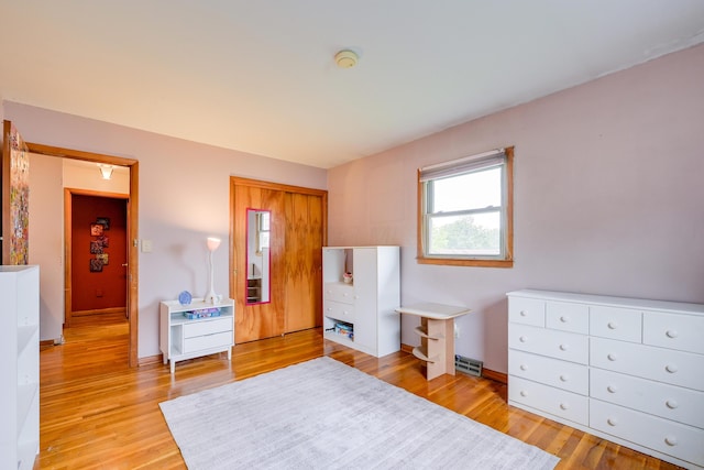 4909 Vanlear Rd, Columbus, OH 43229 - bedroom with light wood-style flooring and baseboards