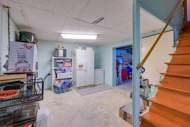 4909 Vanlear Rd, Columbus, OH 43229 - finished basement with white refrigerator with ice dispenser and stairway