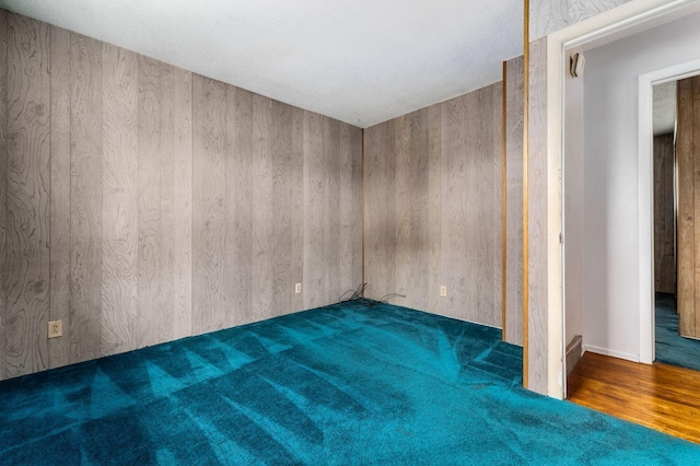 5045 Labelle Dr, Columbus, OH 43232 - empty room with wooden walls and wood finished floors