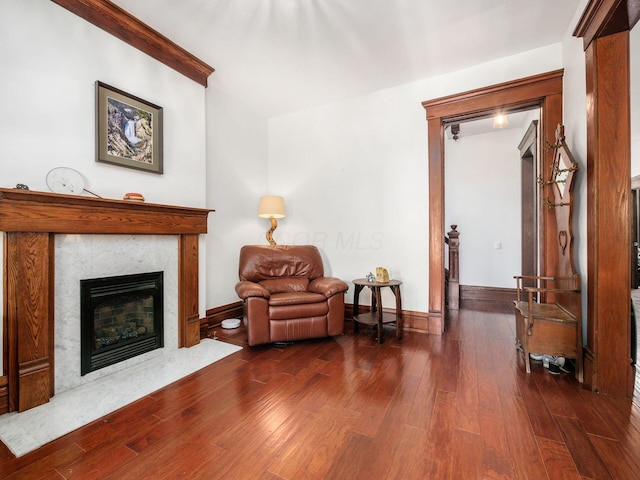 471 W 4th Ave, Columbus, OH 43201 - living area with wood finished floors, a high end fireplace, and baseboards
