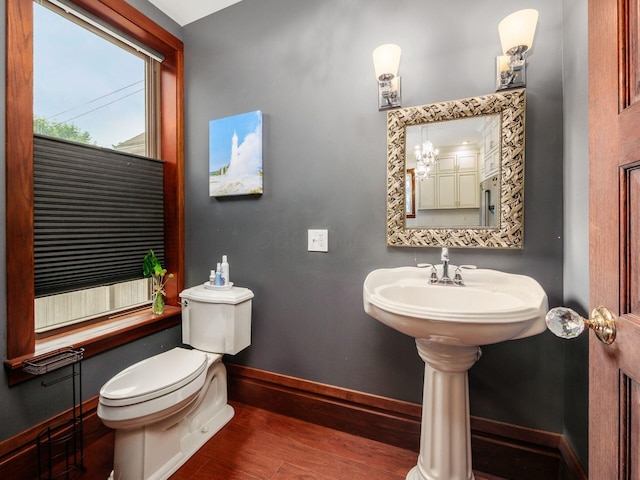 471 W 4th Ave, Columbus, OH 43201 - bathroom featuring wood finished floors and toilet