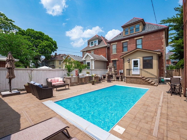 471 W 4th Ave, Columbus, OH 43201 - view of pool featuring an outdoor hangout area, a patio, and a fenced backyard