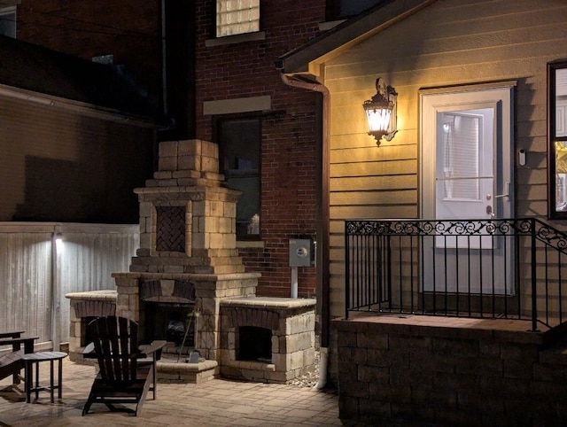 471 W 4th Ave, Columbus, OH 43201 - view of patio / terrace featuring a fireplace