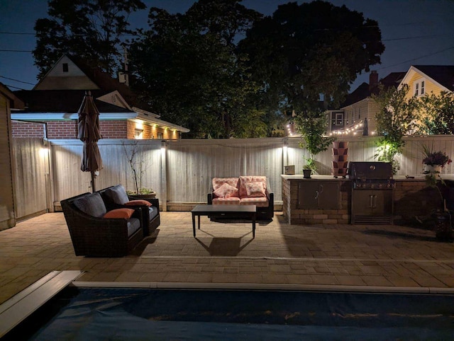 471 W 4th Ave, Columbus, OH 43201 - fenced backyard with a patio, an outdoor hangout area, and area for grilling