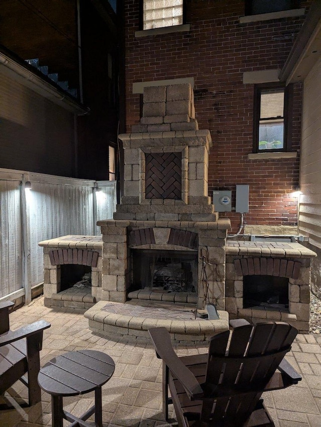 471 W 4th Ave, Columbus, OH 43201 - view of patio / terrace featuring a fireplace
