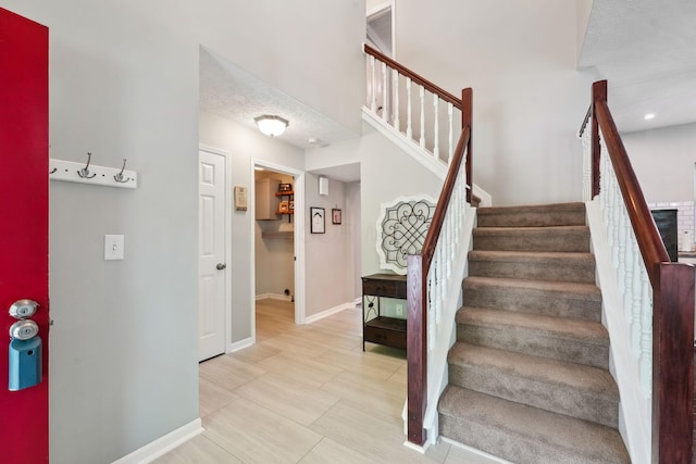 5191 Hialeah Ct, Columbus, OH 43221 - staircase featuring baseboards