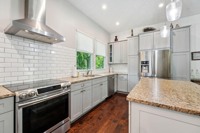 5191 Hialeah Ct, Columbus, OH 43221 - kitchen with stainless steel appliances, wall chimney exhaust hood, dark wood-type flooring, light stone counters, and a sink