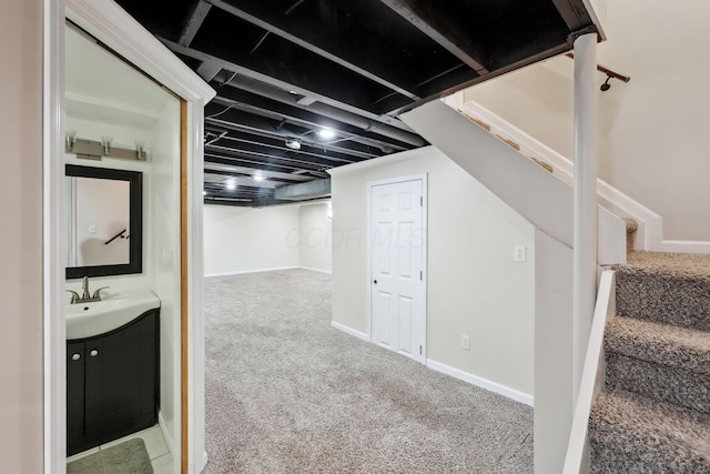 5191 Hialeah Ct, Columbus, OH 43221 - finished basement with carpet, stairs, a sink, and baseboards