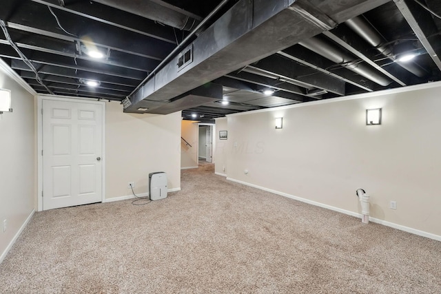 5191 Hialeah Ct, Columbus, OH 43221 - finished below grade area with carpet flooring, baseboards, and stairway