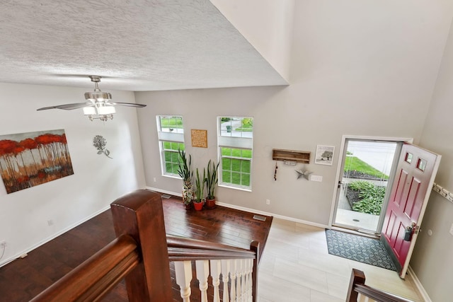 5191 Hialeah Ct, Columbus, OH 43221 - entrance foyer with a ceiling fan, baseboards, and a textured ceiling