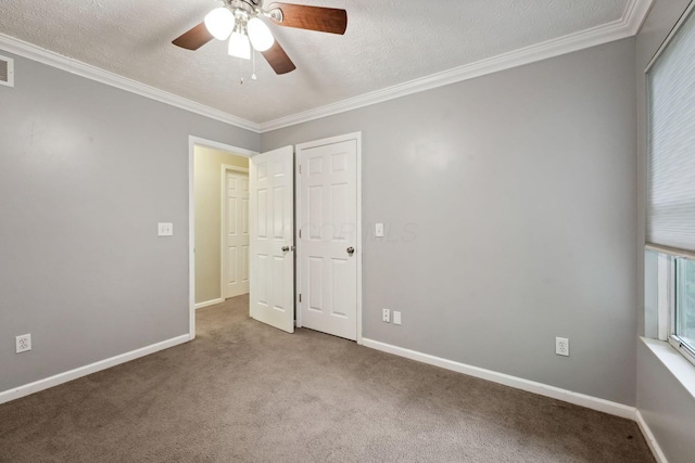 5191 Hialeah Ct, Columbus, OH 43221 - unfurnished bedroom with carpet floors, a textured ceiling, baseboards, crown molding, and a ceiling fan