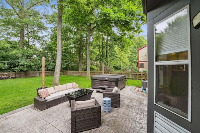 5191 Hialeah Ct, Columbus, OH 43221 - view of patio featuring a hot tub, an outdoor living space, central air condition unit, and view of wooded area