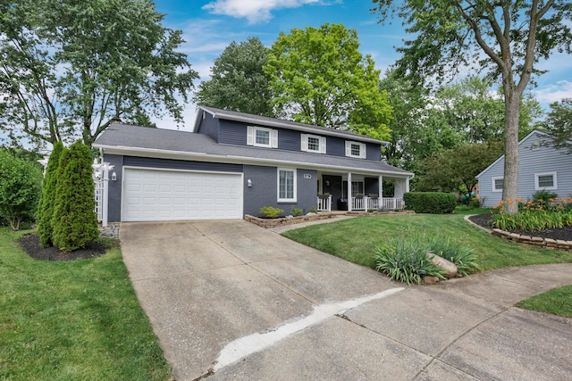 68 Nadine Pl N, Westerville, OH 43081 - traditional-style house with covered porch, an attached garage, driveway, and a front lawn