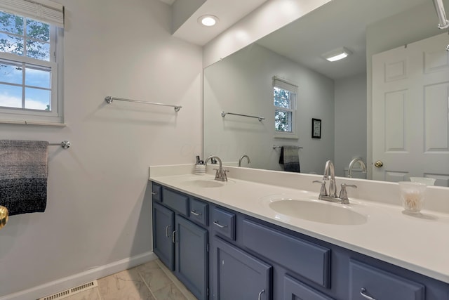 68 Nadine Pl N, Westerville, OH 43081 - full bathroom featuring marble finish floors, double vanity, and recessed lighting