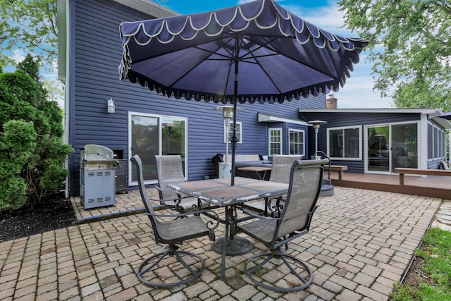 68 Nadine Pl N, Westerville, OH 43081 - view of patio with outdoor dining space, grilling area, and a deck