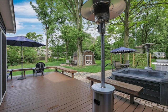 68 Nadine Pl N, Westerville, OH 43081 - wooden terrace featuring a hot tub, a storage shed, and a lawn