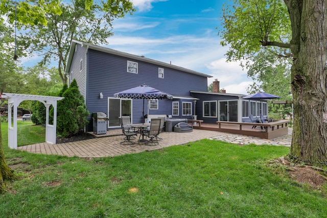 68 Nadine Pl N, Westerville, OH 43081 - rear view of house with a sunroom, a pergola, a patio area, a deck, and a yard