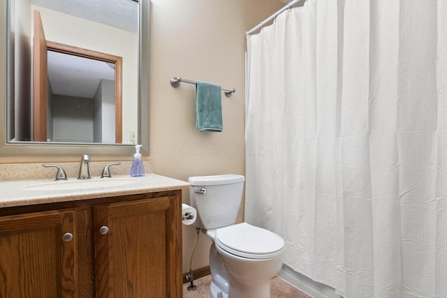 4686 Gilman Rd, Columbus, OH 43228 - full bath featuring toilet, vanity, tile patterned floors, and a shower with shower curtain