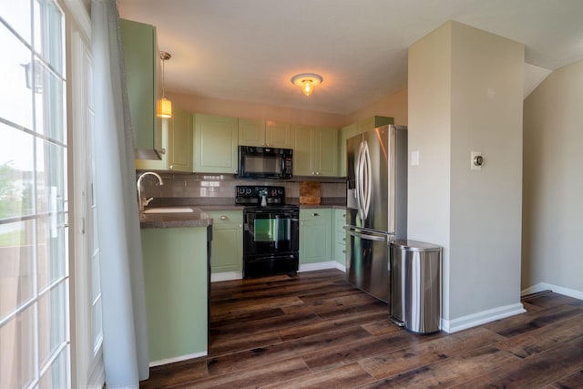 5834 Aristides Way Unit 10, New Albany, OH 43054 - kitchen with black appliances, dark wood-type flooring, backsplash, and green cabinetry